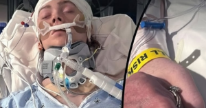 SON COMMUNICATES THROUGH A HAND SQUEEZE, MOM AND DAD STAY STRONG.