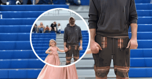A DUSTY COAL MINER HURRIED FROM HIS SHIFT TO ATTEND HIS DAUGHTER'S HOMECOMING